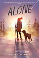 Girl walking with a dog on snow