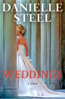 a blond woman facing away in a wedding dress by pillars